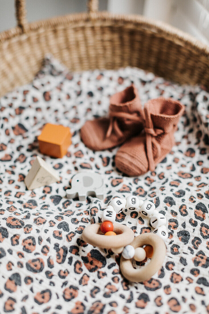 Basket with blanket and baby accessories