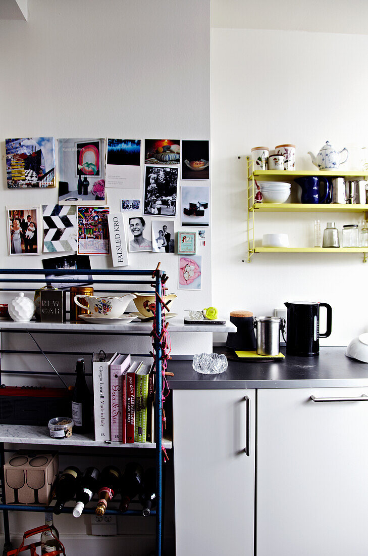 Kitchen corner with wall collage and shelves