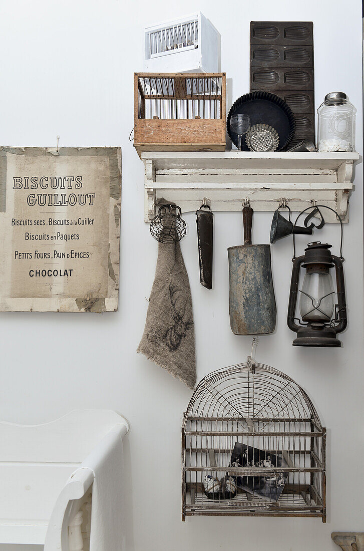 Collection of antique kitchen utensils as Shabby Chic decoration