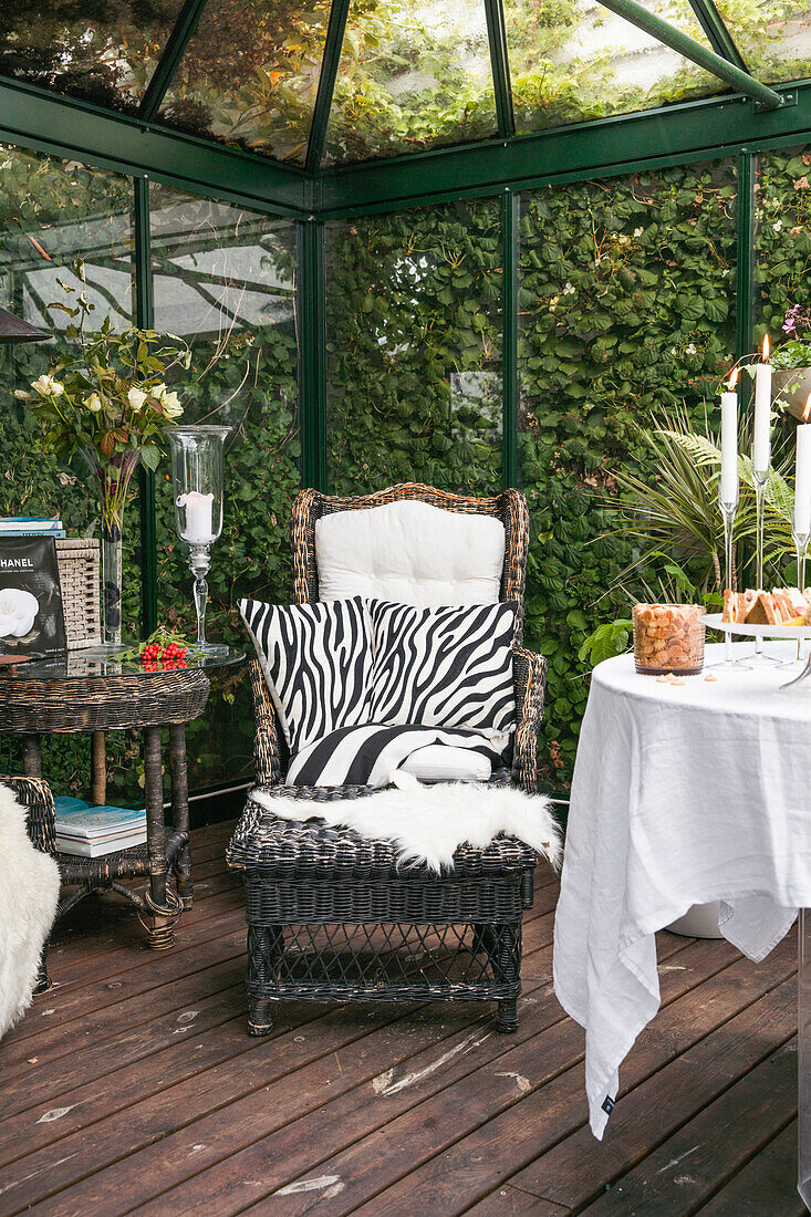 Rattan chairs and tables in the winter garden