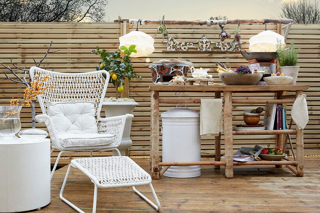 White rattan furniture with bamboo table on balcony