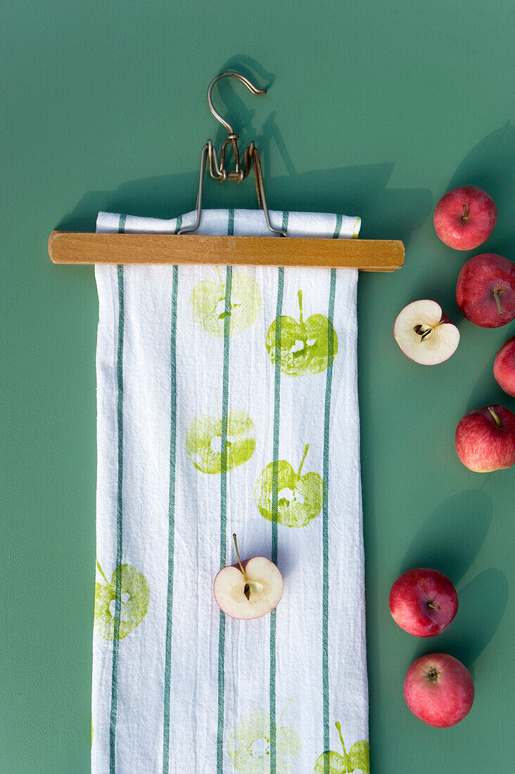 Textile printing on kitchen towel with apple halves