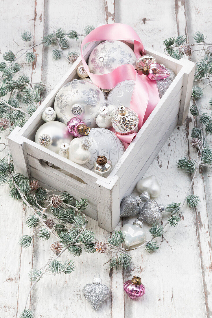Christmas decoration in a box on wood