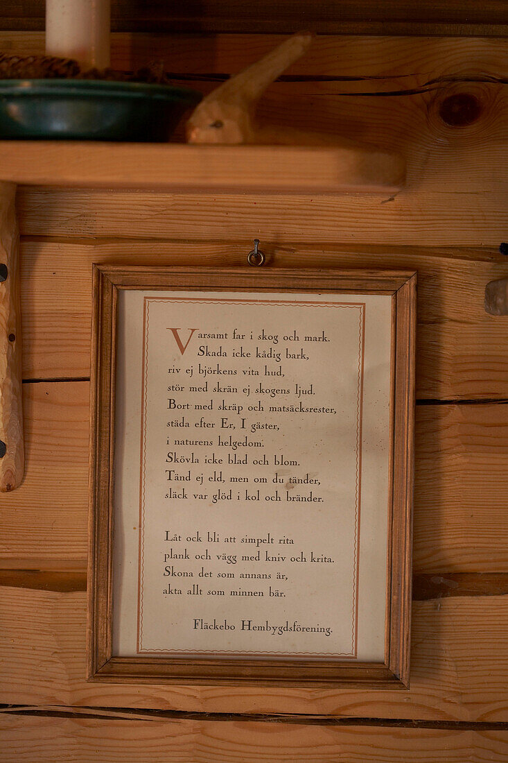 Visitor instructions on wall of hunting cabin in Svartadalen, Sweden