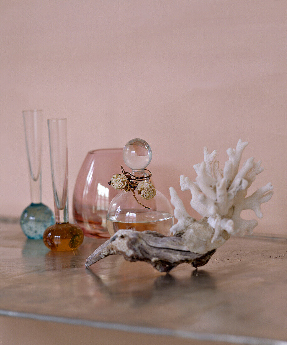 Decorative glass vases, flacon and shell with coral