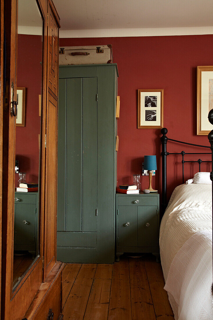 Mirrored wardrobe in bedroom of Brighton home, UK