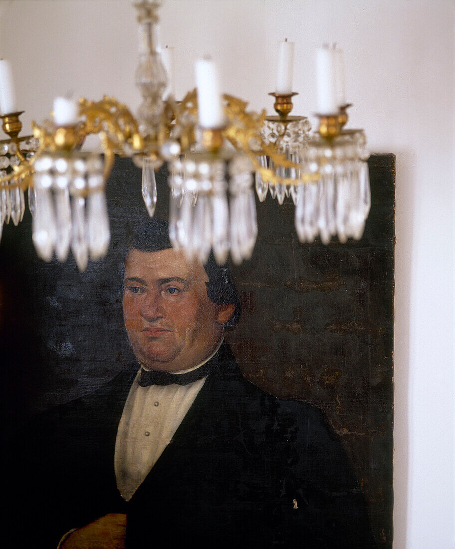 Period portrait and glass chandelier Stockholm Sweden