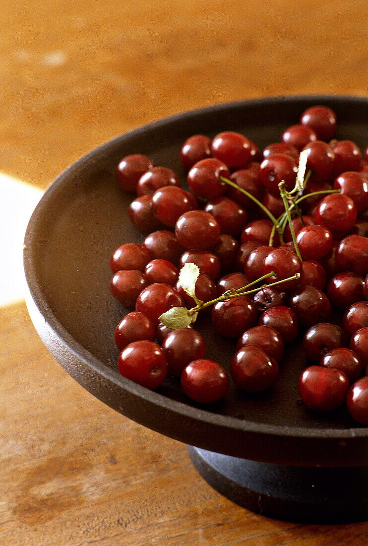 Bowl of cherries interiors detail fruit