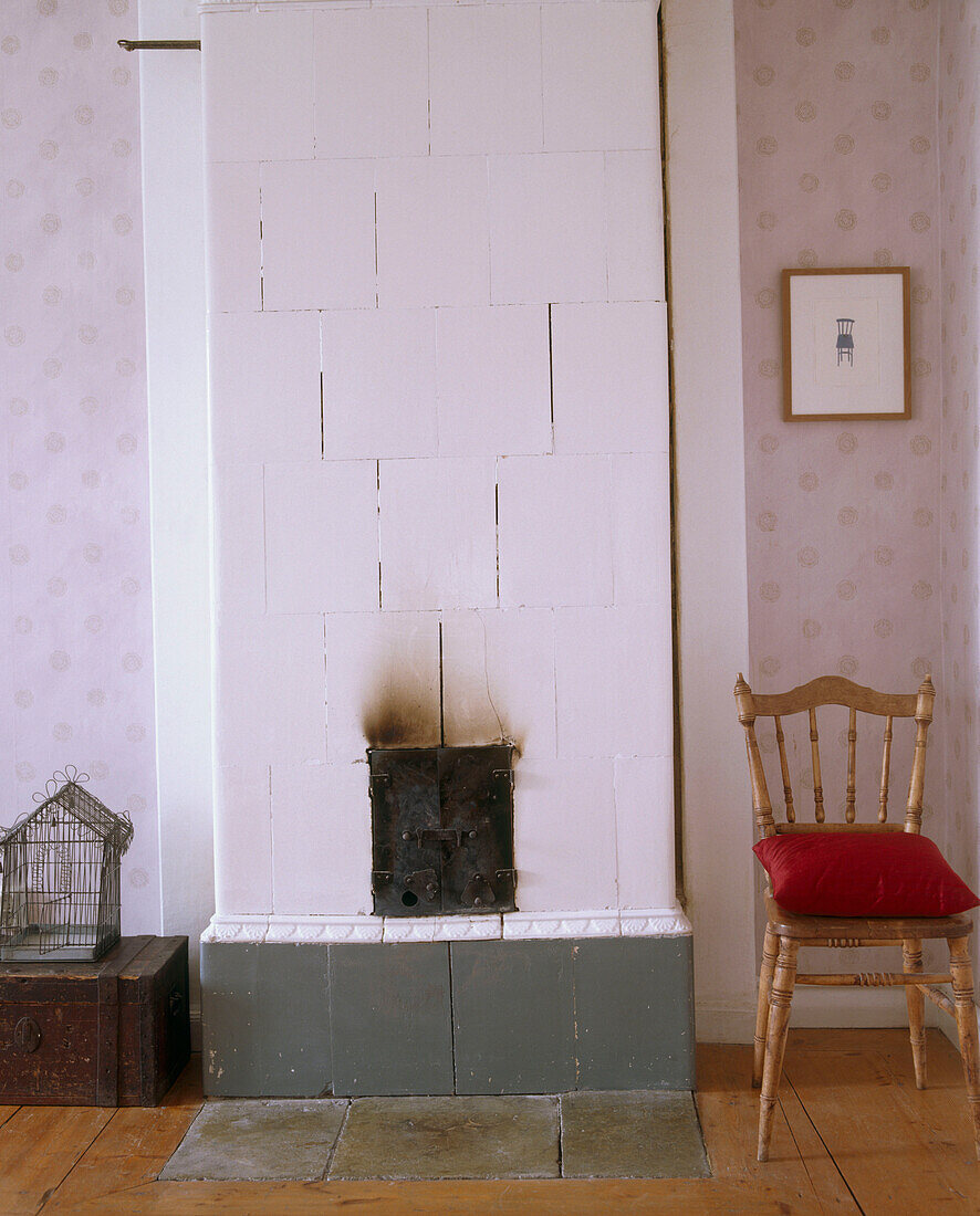 A detail of a traditional Scandinavian ceramic fireplace