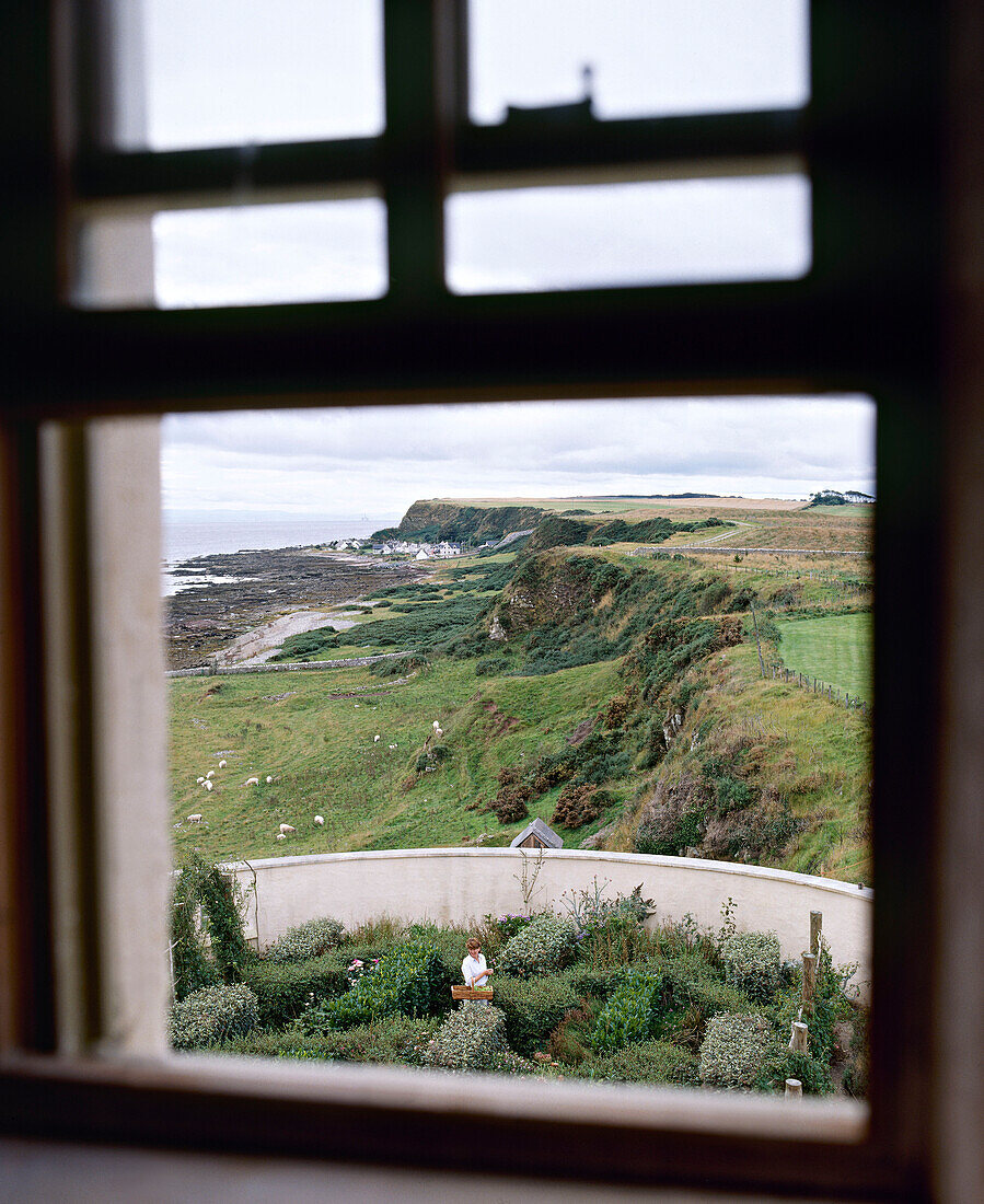View out of window to coastal landscape