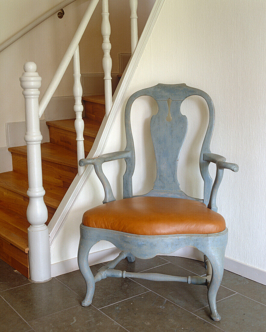 Hallway with painted Gustavian chair in Mjolby, Sweden