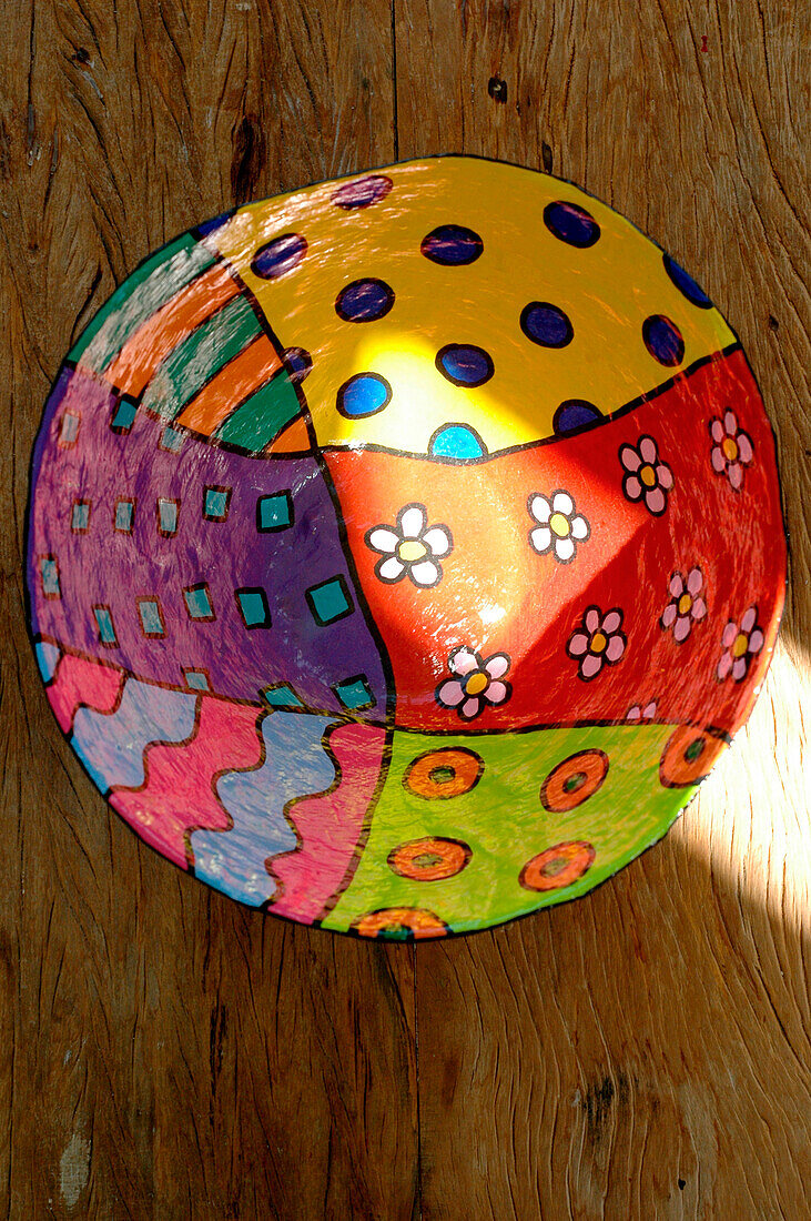 Hand painted and brightly coloured bowl