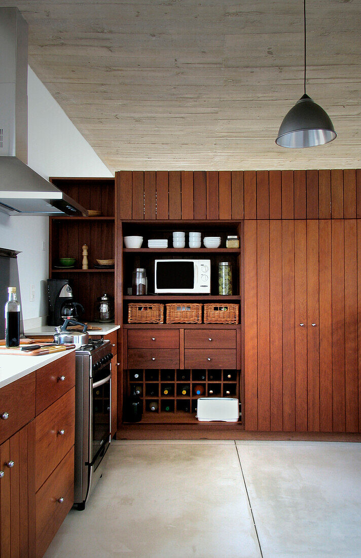 Dark wood kitchen with freestanding units