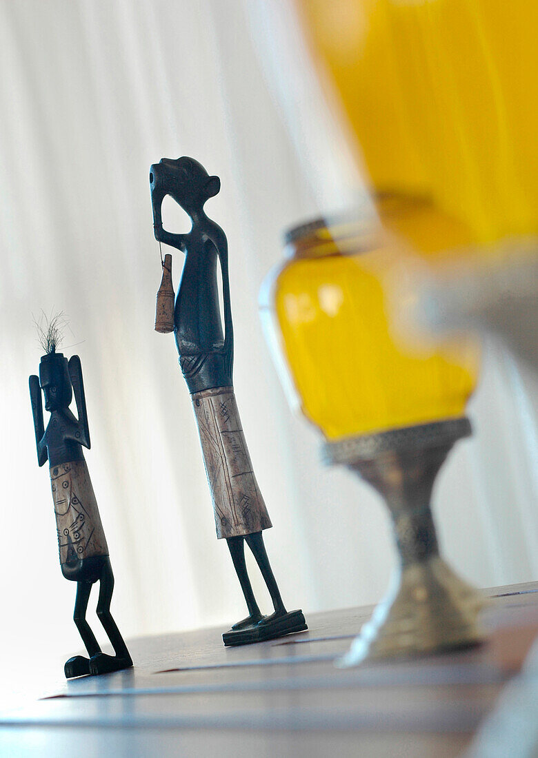 Indian figurines and glass lamps