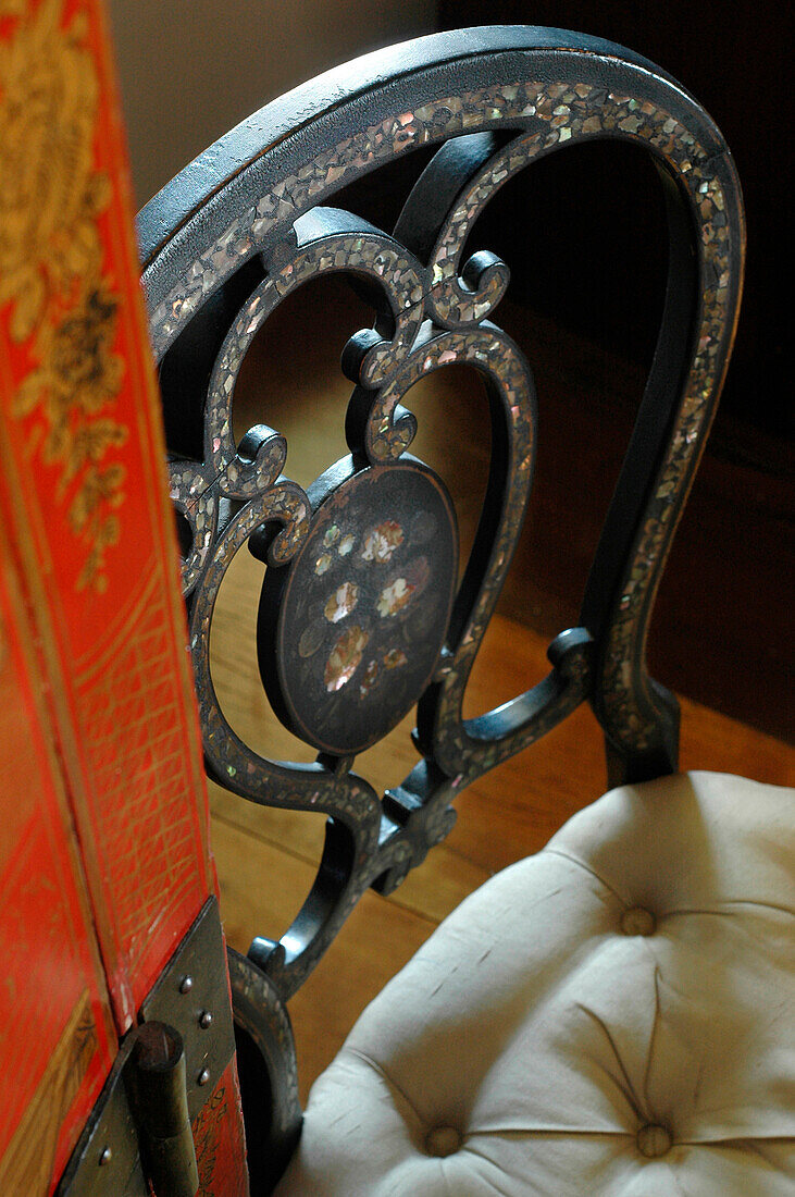 Ornate carved chair back