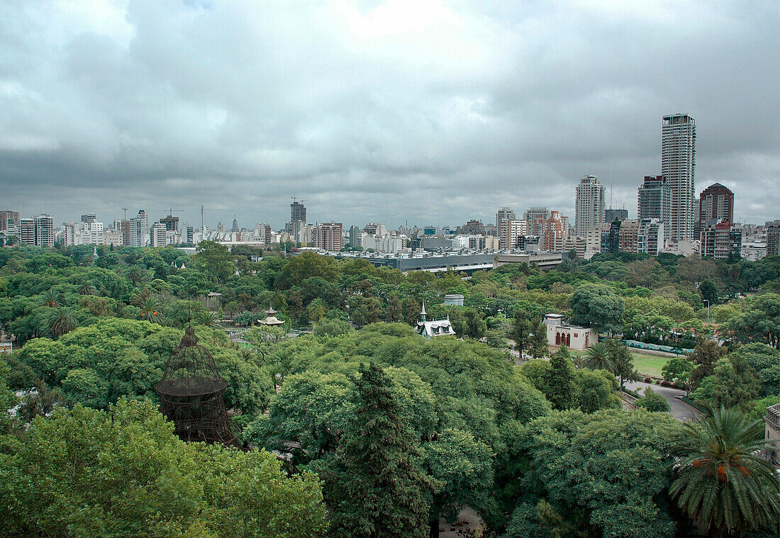 Elevated city view of skyline and parkland