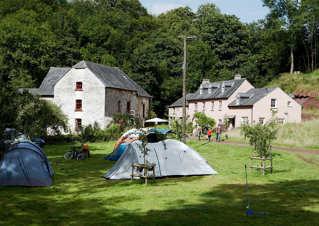 Pitched tents in grounds of barn conversion