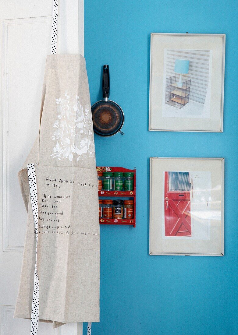 Handwriting on apron in turquoise 1950s style kitchen