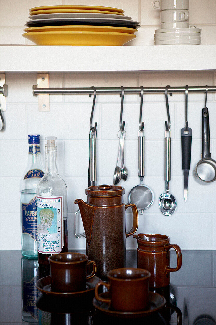 Pottery coffee set and stainless steel utensils in 1820s Georgian townhouse kitchen