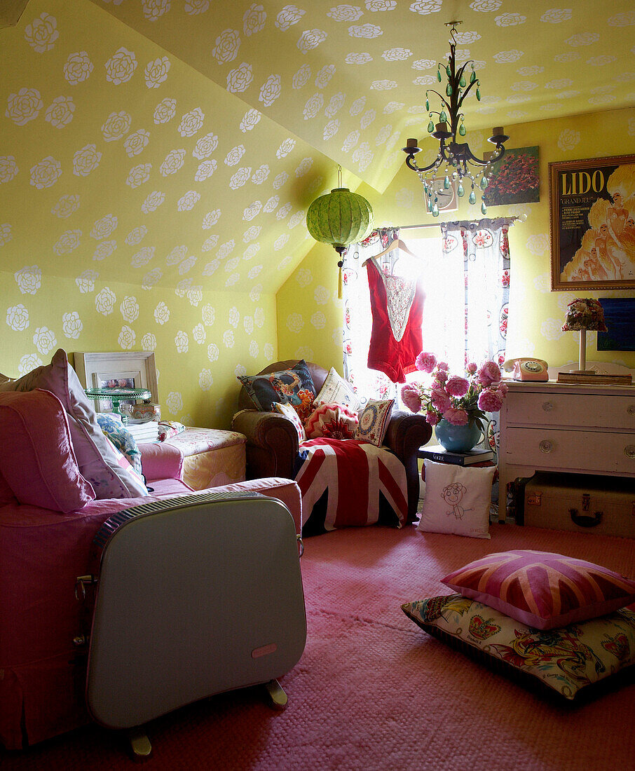 Pink accessories in yellow wallpapered Georgian farmhouse bedroom