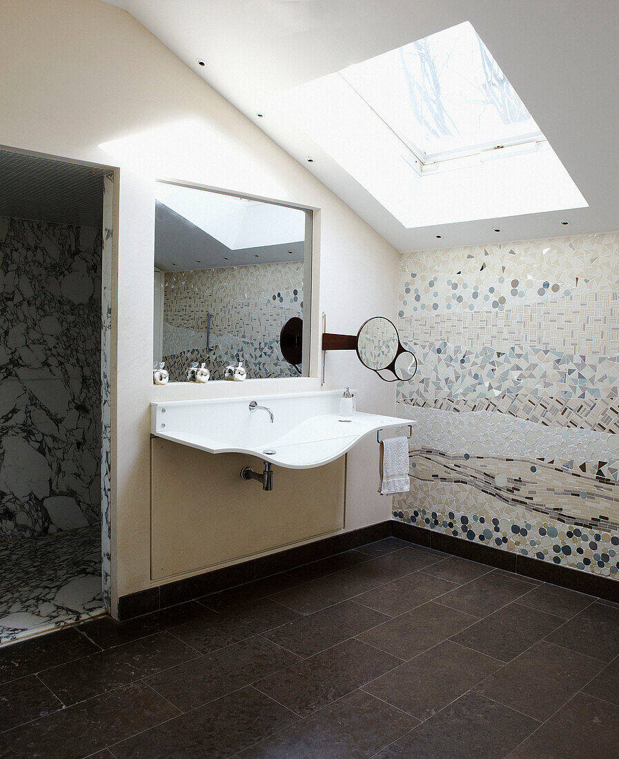Mosaic tiled bathroom with marble walk-in shower