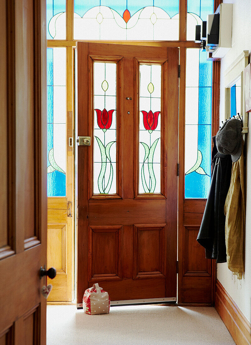 Panelled stained glass door in entrance hallway Wairarapa North Island New Zealand