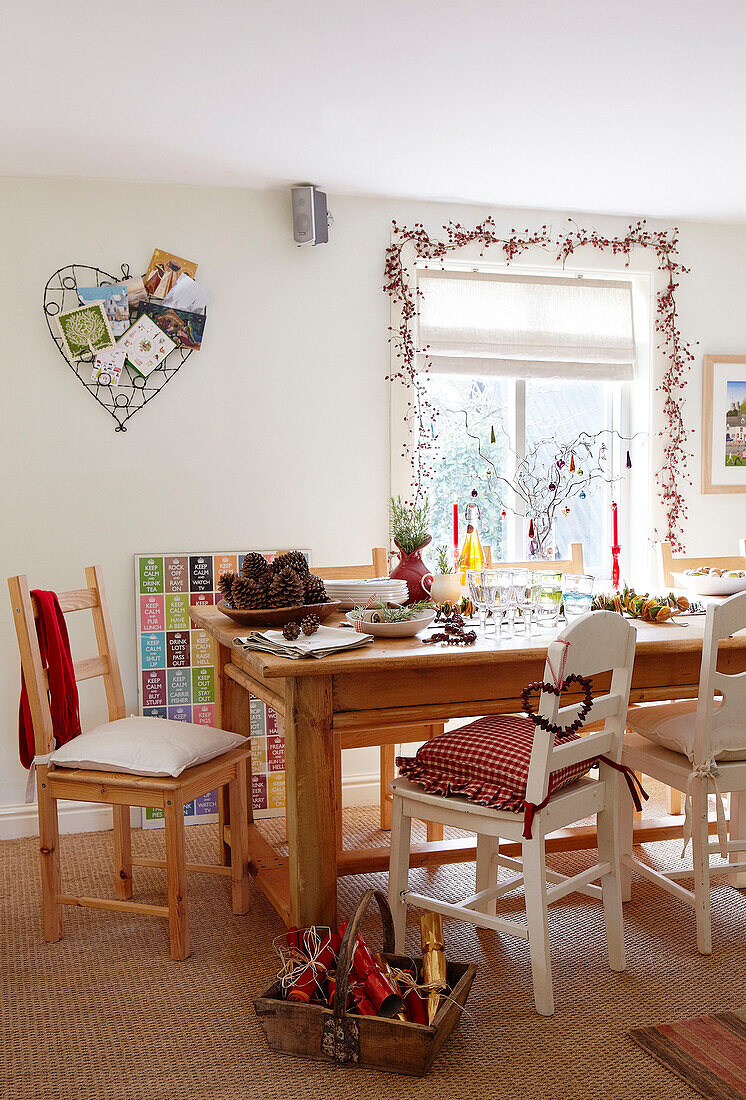 Preparations for Christmas in country home dining room