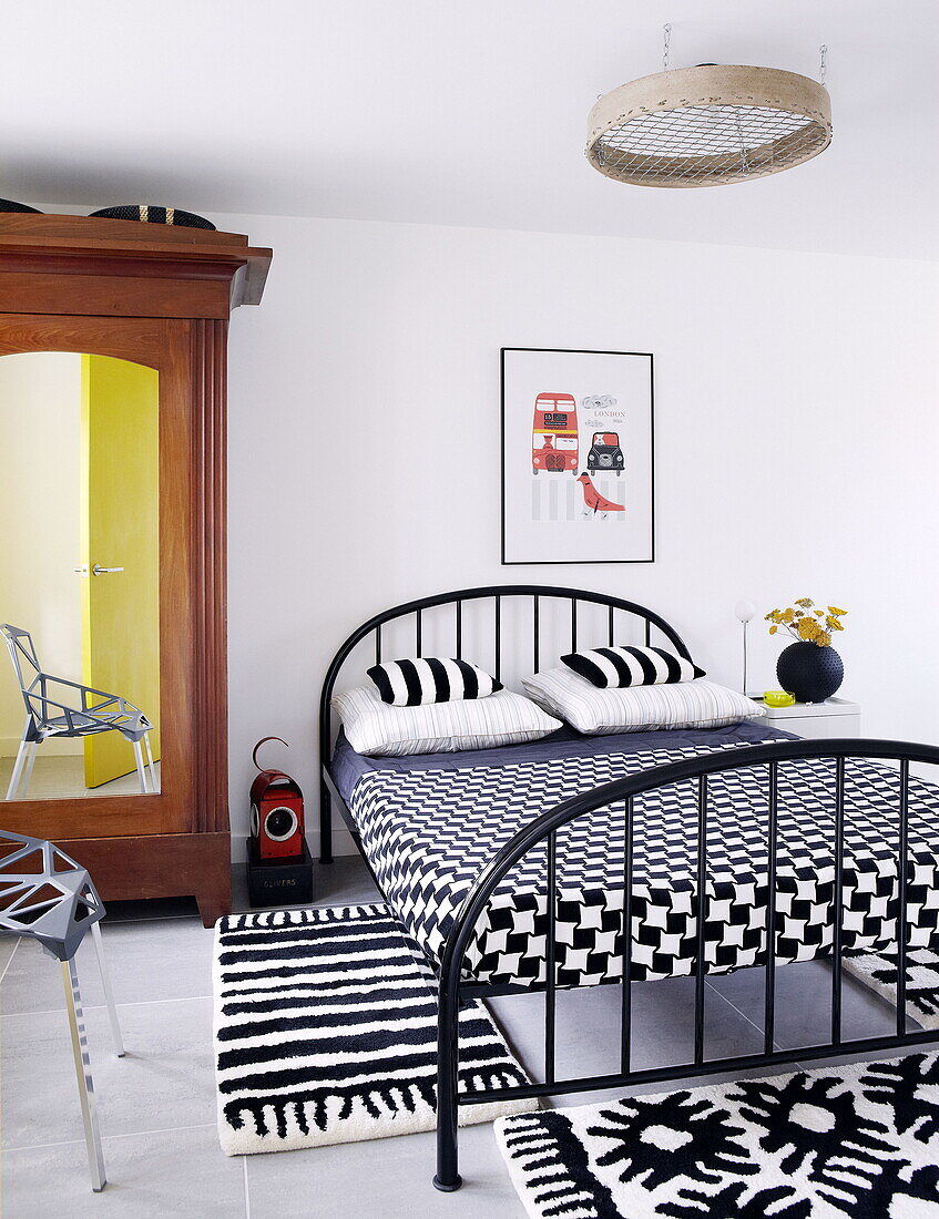 Bedroom with black and white soft furnishing Newcastle England UK