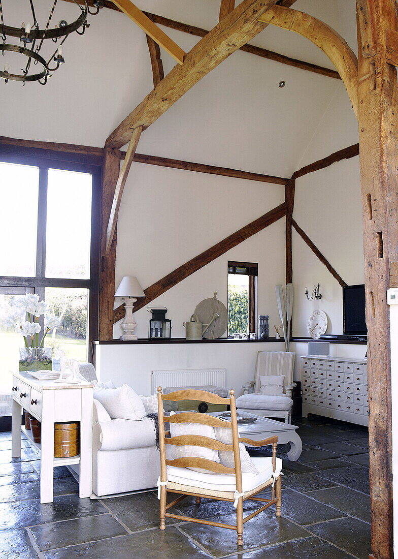 Double height timber framed living room in Forest Row farmhouse conversion Surrey England UK