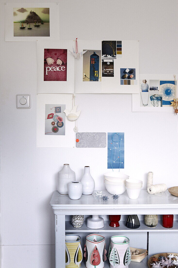 Moodboard and shelf unit with ceramic vases in Bussum home, near Amsterdam, Netherlands