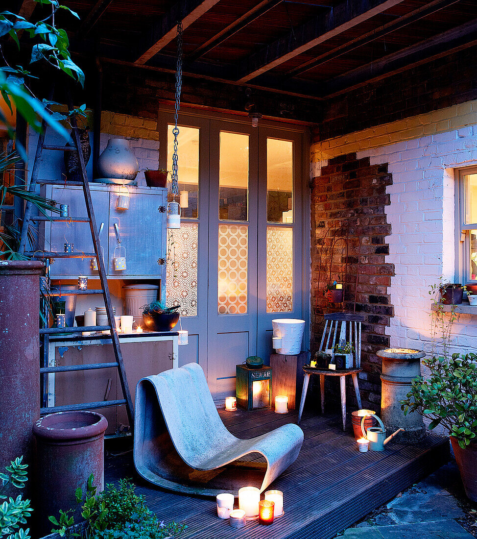 Candlelit porch exterior of London home England UK