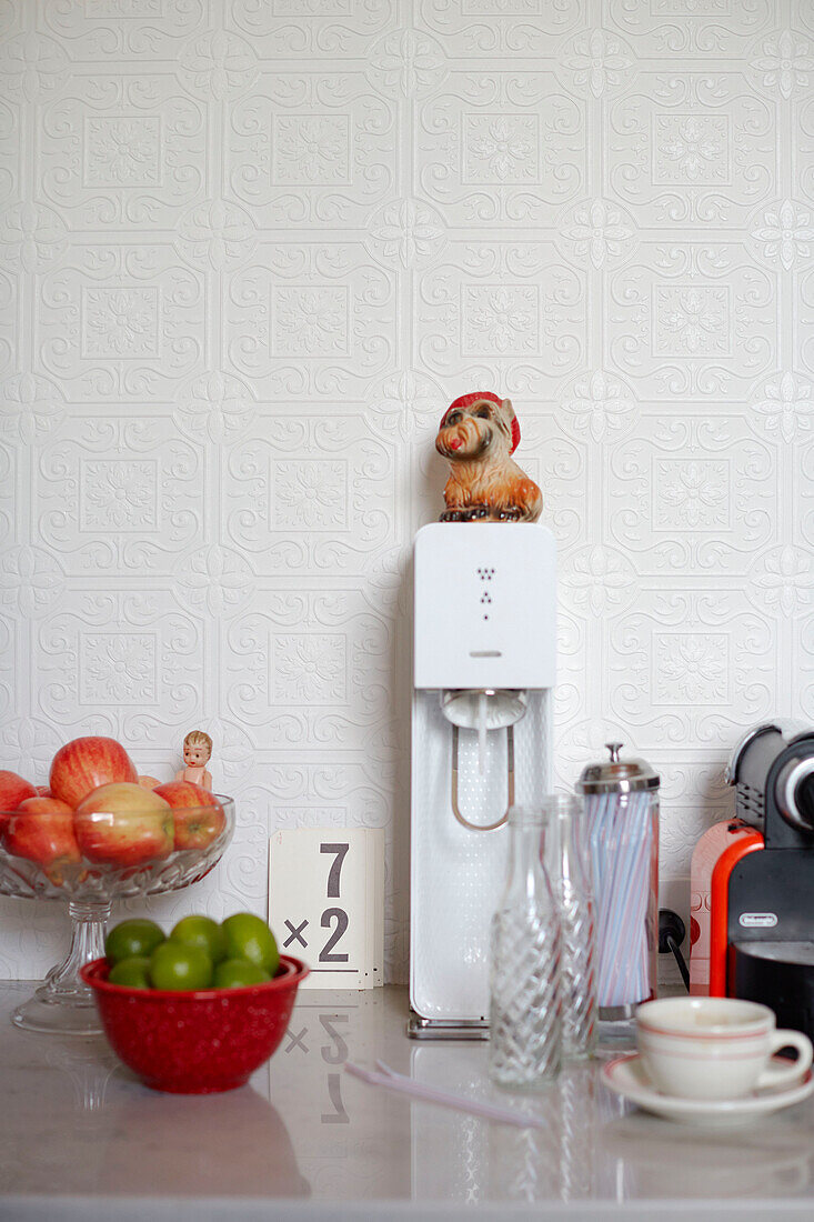 Fruit bowls and soda stream with dog figurine in Auckland kitchen North Island New Zealand