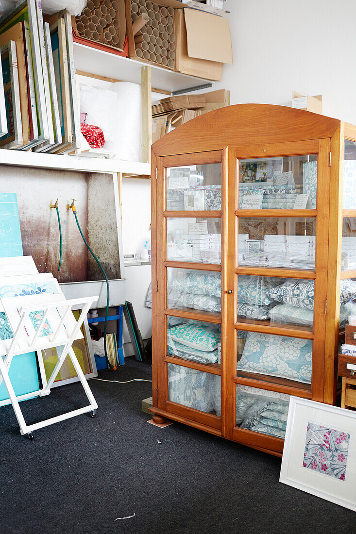 Drapers cabinet with stock in textile designers' Birmingham work studio England UK