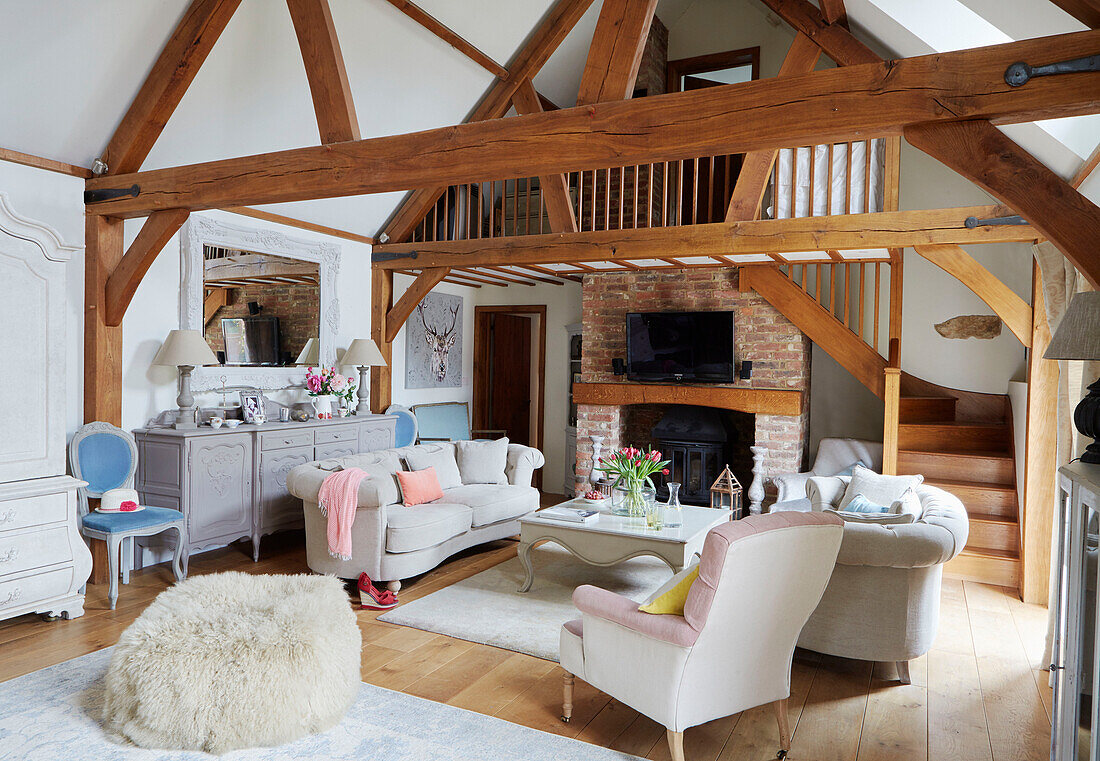 Timber framed living room with mezzanine in Kent home, England, UK