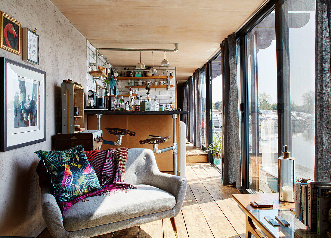 Sofa in living space of converted shipping container in Bedford, UK