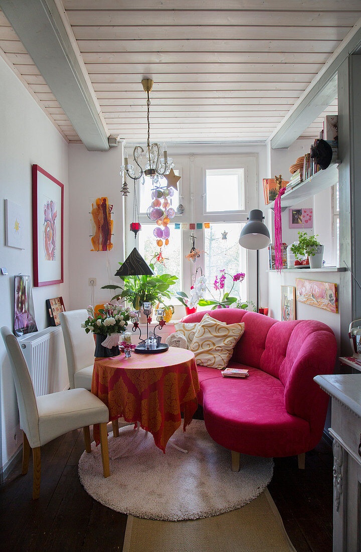 Sofa, upholstered chairs and small table in tiny living room