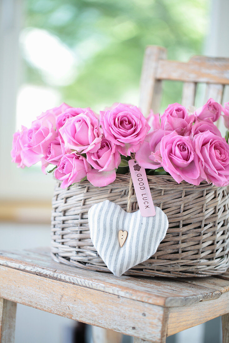 Gift basket with roses, heart and 'Good Luck' pendant