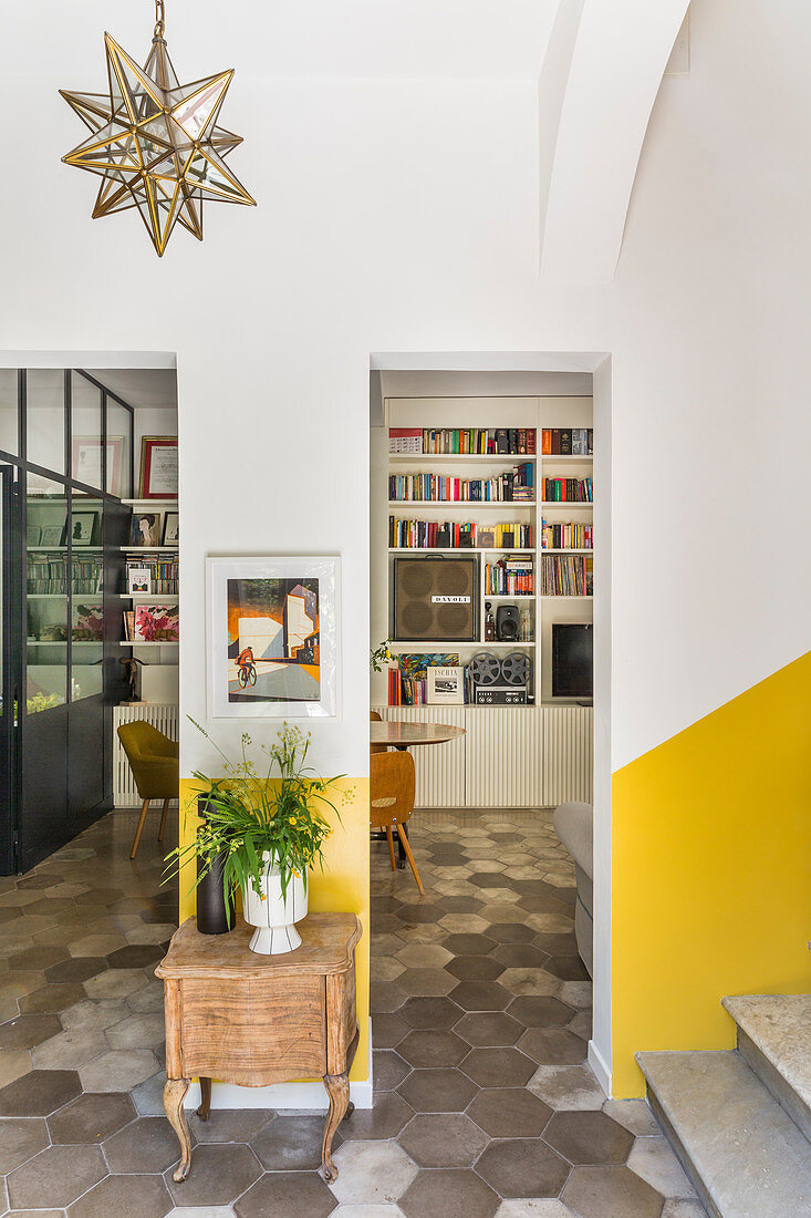 Baroque wooden cabinet next doorway leading into living space