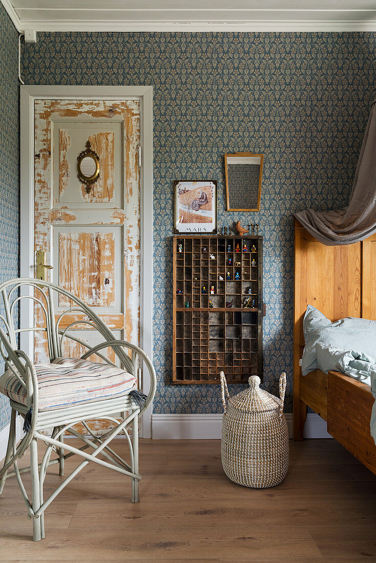 Antique wooden bed and chair in child's bedroom