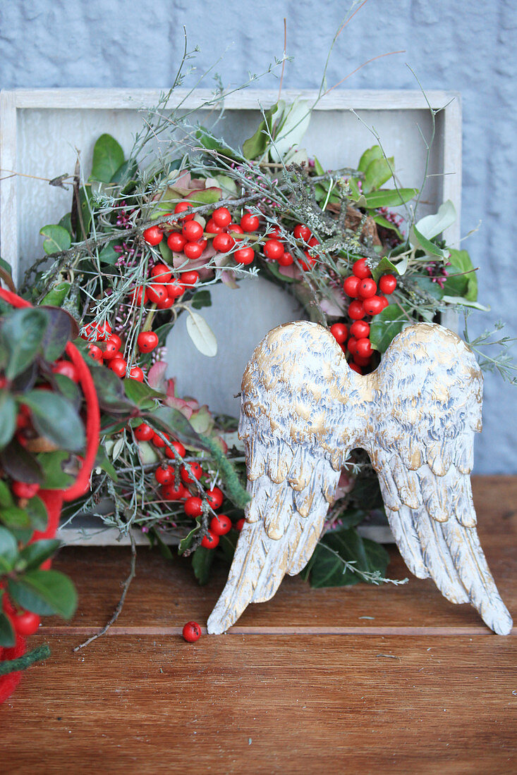 Angel wings and autumn wreath of teaberries