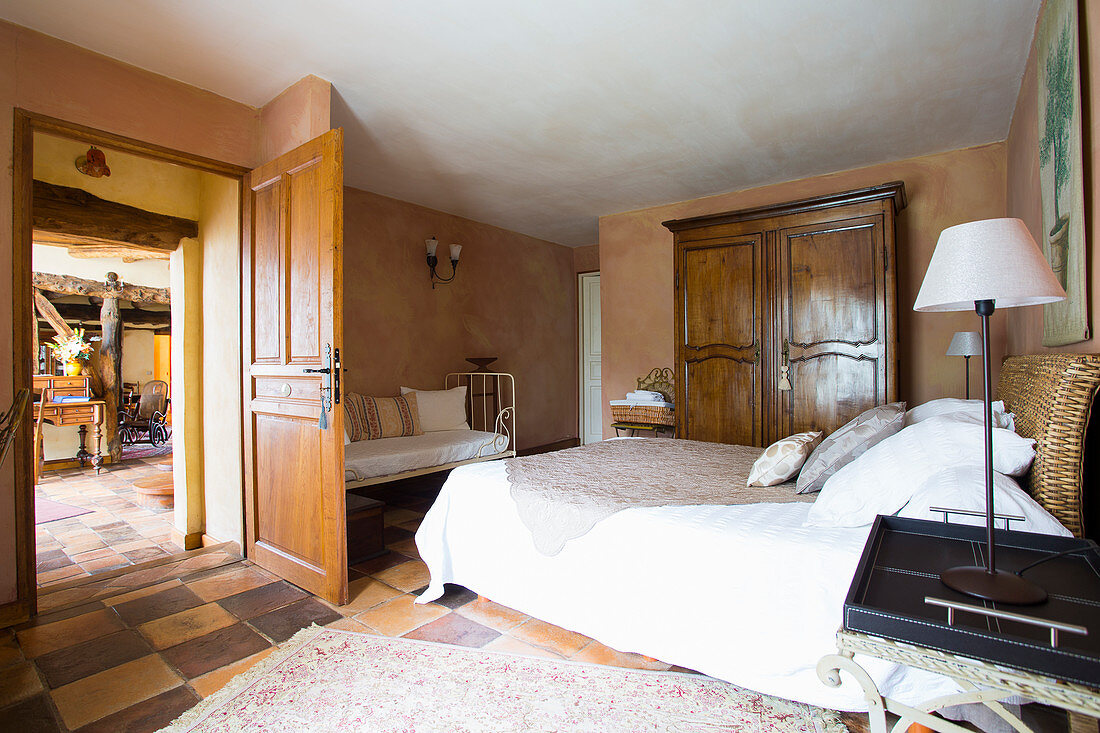 Rustic bedroom with open door