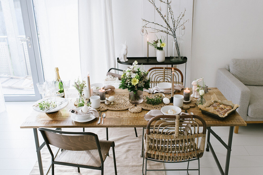 A table laid for an Easter meal in natural colours