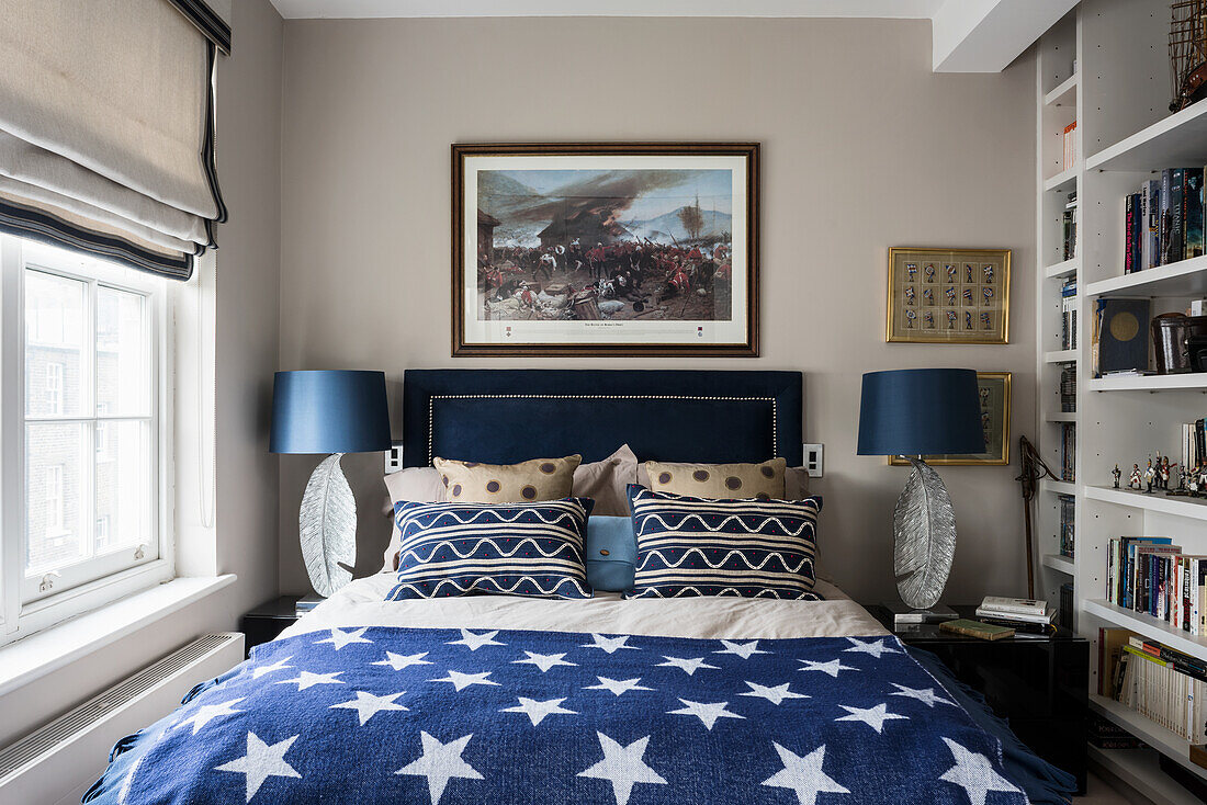 Nickel leaf table lamps with star bedspread and military artwork
