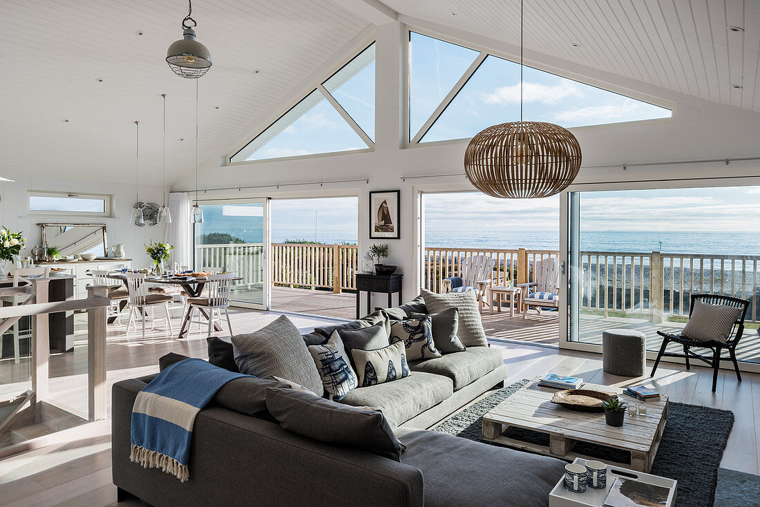 Open plan living room with sea views