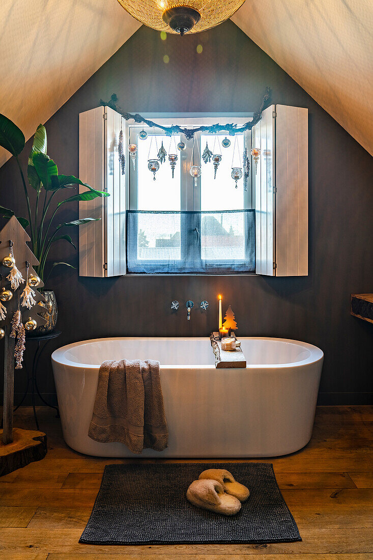 Freestanding bathtub in the attic, Christmas decorations