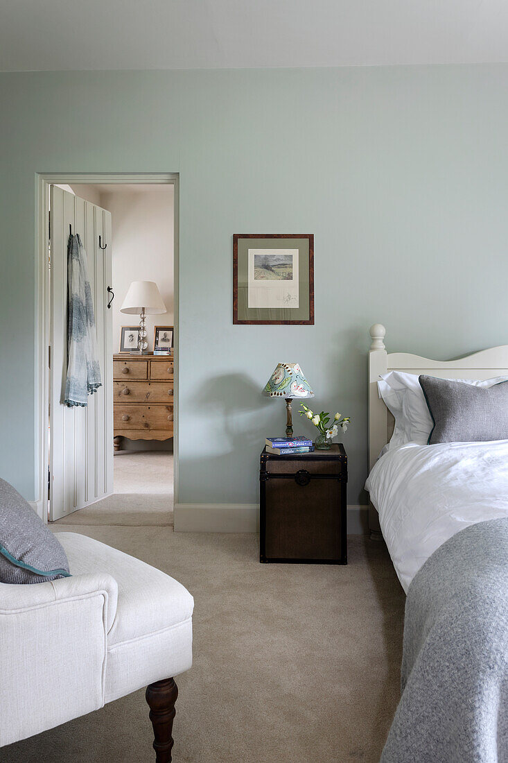 Guest room with blue grey wall
