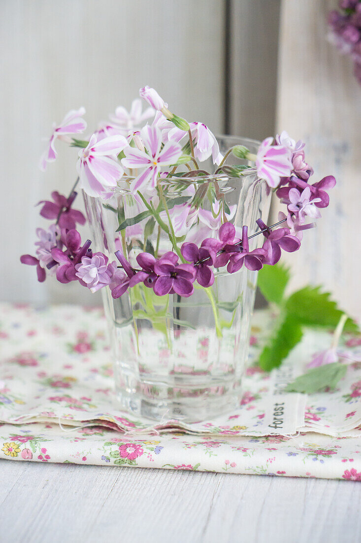 Drinking glass with lilac wreath