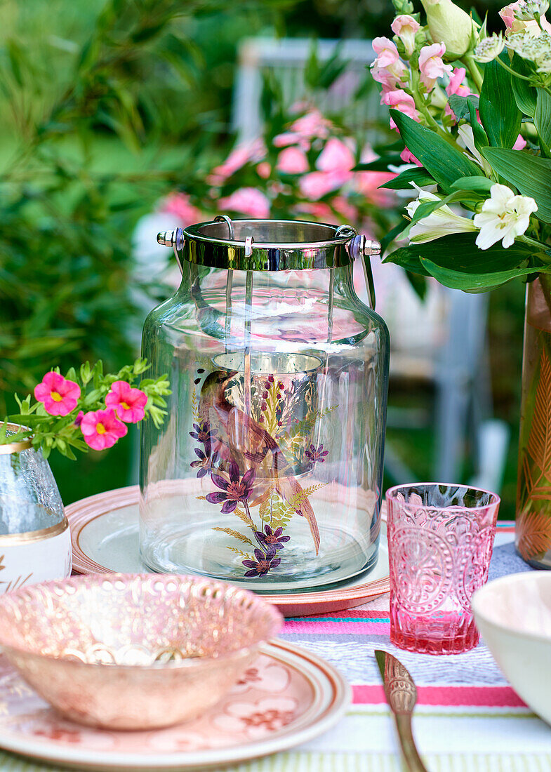 Retro glass vase on set garden table