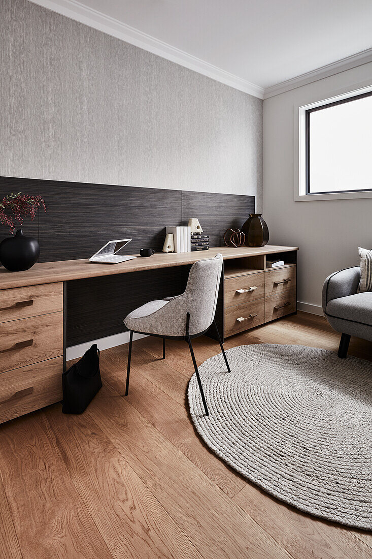 Modern home office with built-in joinery and reading nook
