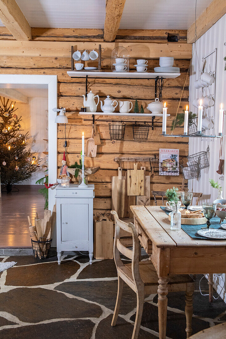 Rustic kitchen interior with wooden furniture and Christmas decorations